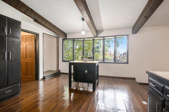 interior space featuring beam ceiling and dark wood-type flooring