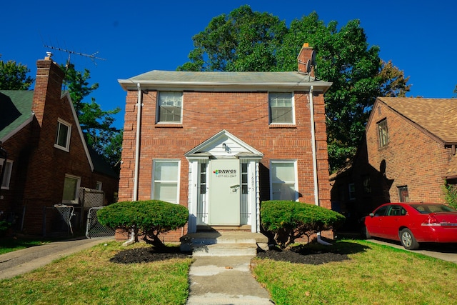 view of front of home with a front yard