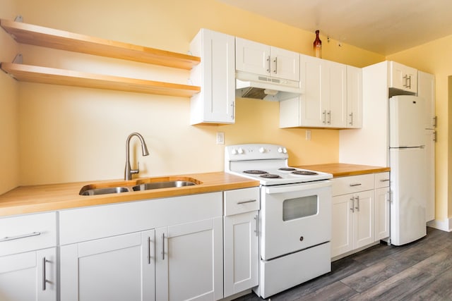 kitchen with wood counters, white appliances, white cabinets, sink, and dark hardwood / wood-style flooring