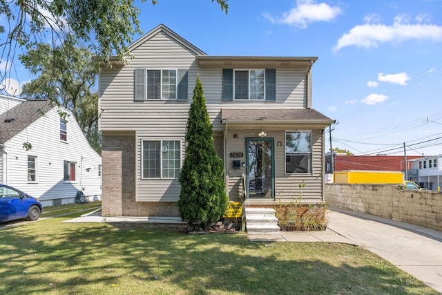 view of front of home with a front yard