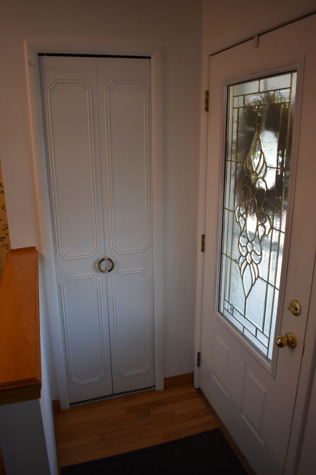 doorway to outside featuring hardwood / wood-style floors