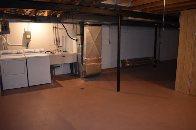 basement with separate washer and dryer