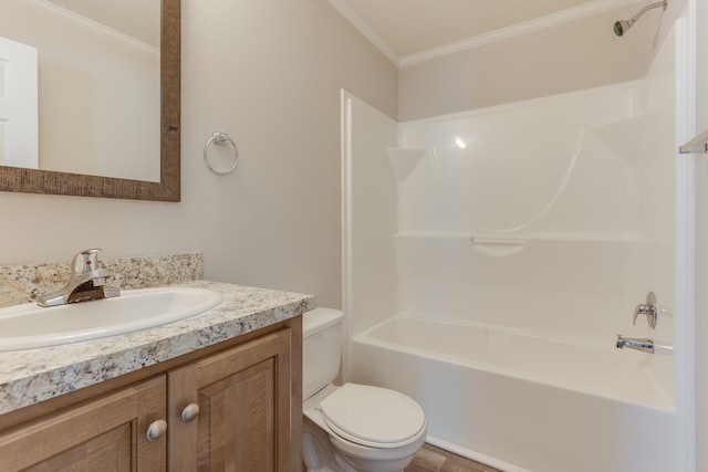 full bathroom featuring shower / bathing tub combination, vanity, toilet, and crown molding