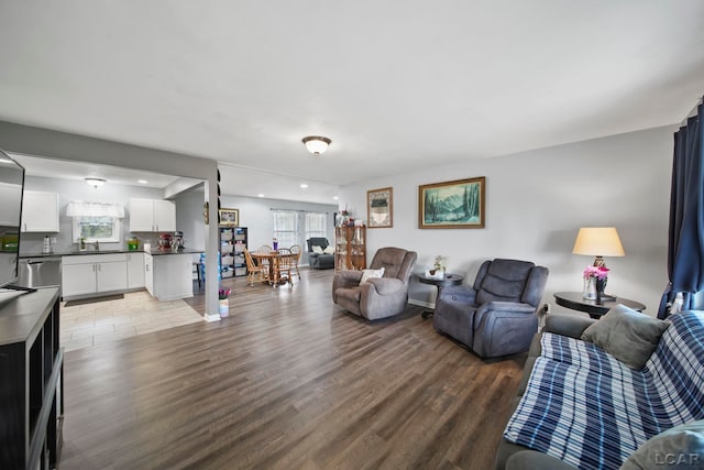 living area featuring recessed lighting and light wood finished floors