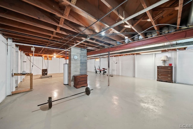 unfinished below grade area featuring gas water heater