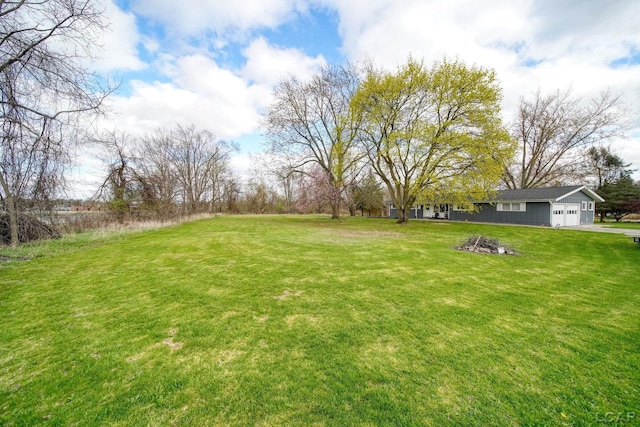 view of yard featuring a garage