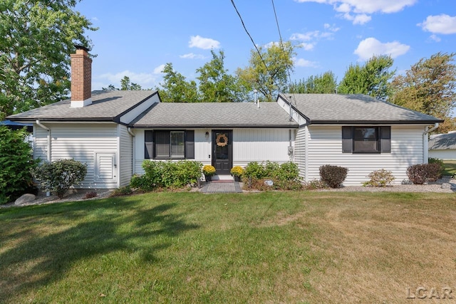 ranch-style home with a front yard