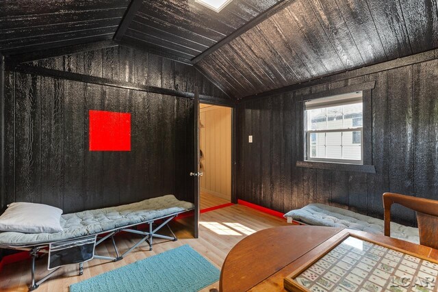 6103 Highland Ave, Manitou Beach, MI 49253 - misc room featuring lofted ceiling, wood finished floors, wooden walls, and wood ceiling