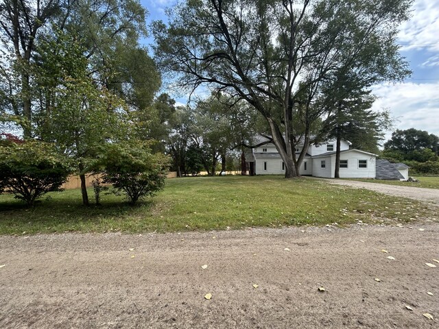 13664 Wabasis Ave NE, Cedar Springs, MI 49319 - view of grassy yard with driveway