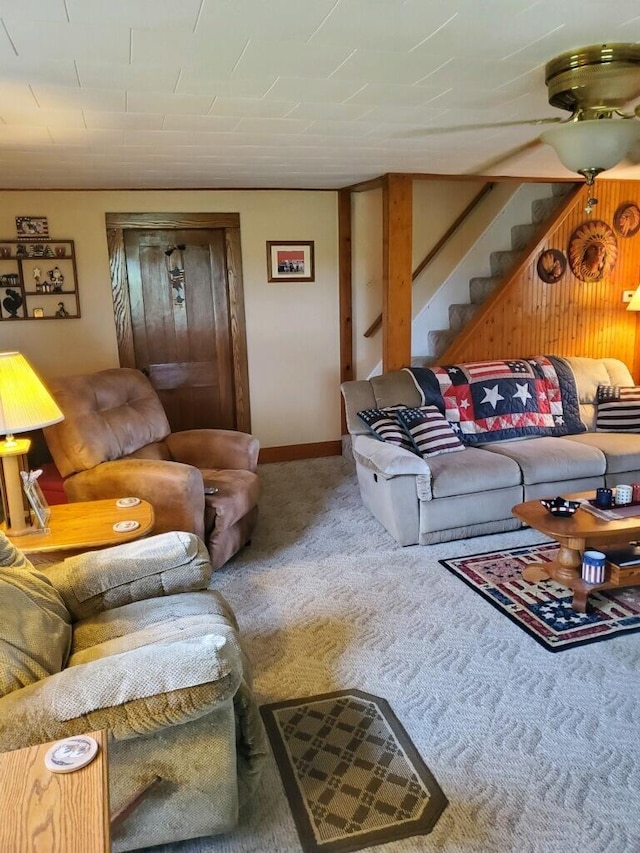 living room featuring ceiling fan and carpet floors