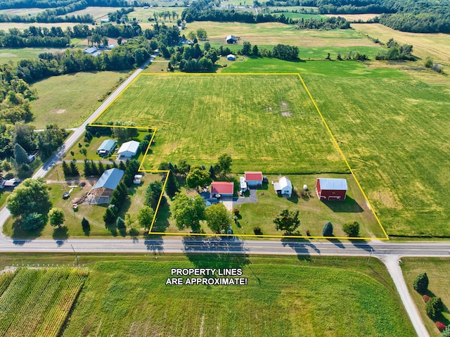 birds eye view of property featuring a rural view