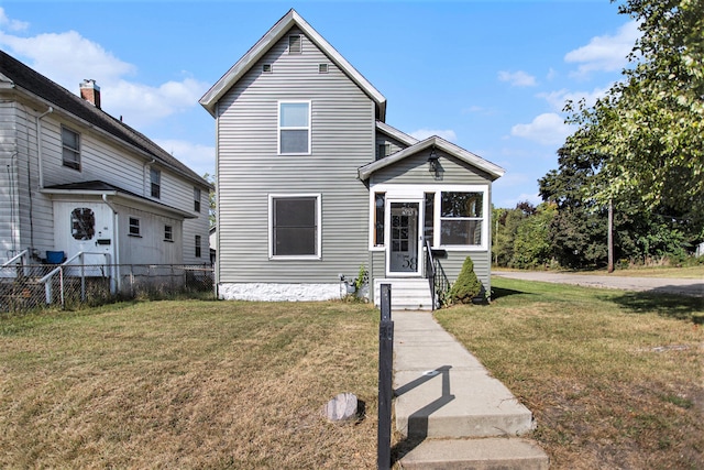 view of front facade featuring a front yard