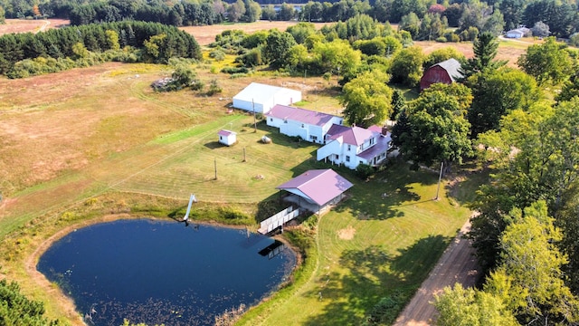 drone / aerial view featuring a water view and a rural view