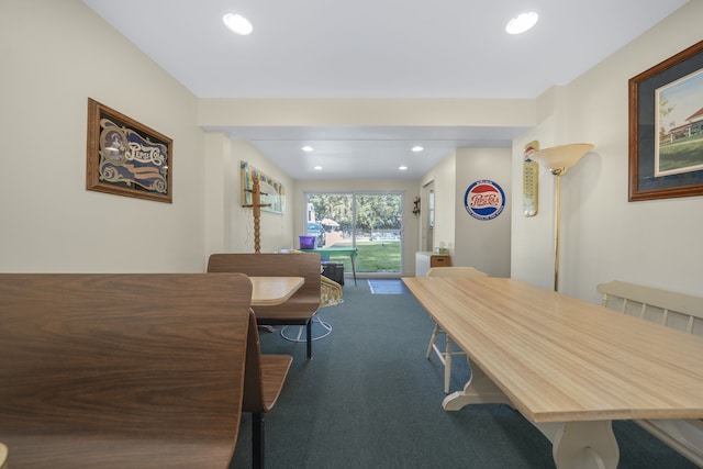 dining space featuring carpet flooring