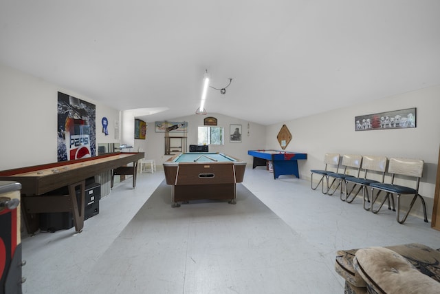 game room with vaulted ceiling and pool table