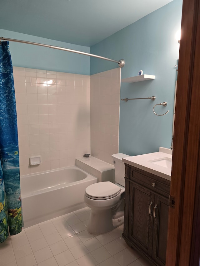 full bathroom featuring tile patterned flooring, vanity, shower / bath combo, and toilet