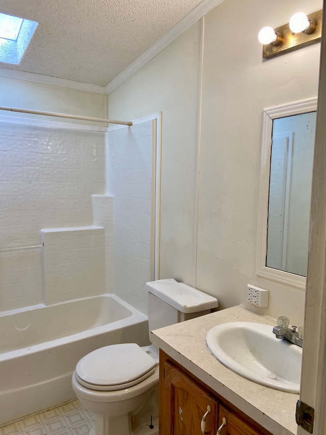 full bathroom featuring vanity,  shower combination, crown molding, a skylight, and a textured ceiling