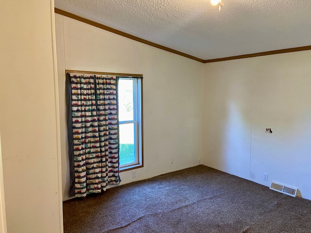 empty room featuring carpet flooring, a textured ceiling, and ornamental molding