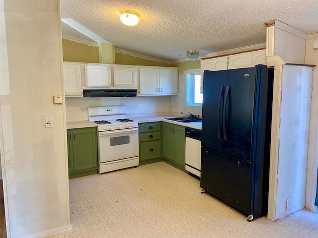 kitchen with ornamental molding, white appliances, green cabinets, sink, and lofted ceiling