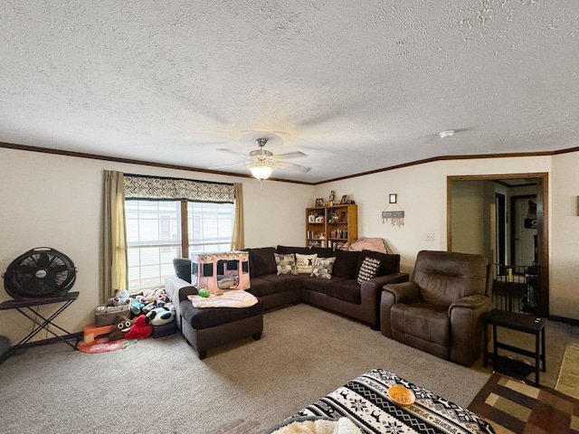 living room featuring carpet flooring, ceiling fan, ornamental molding, and a textured ceiling