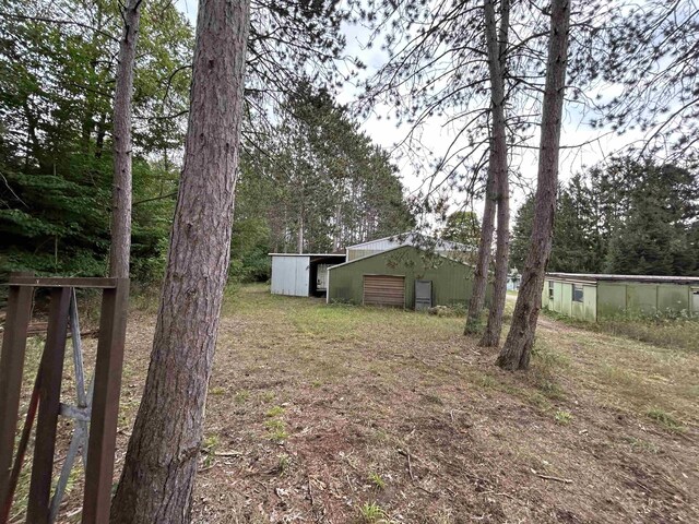 2768 S M-88, Bellaire, MI 49615 - view of yard with an outbuilding