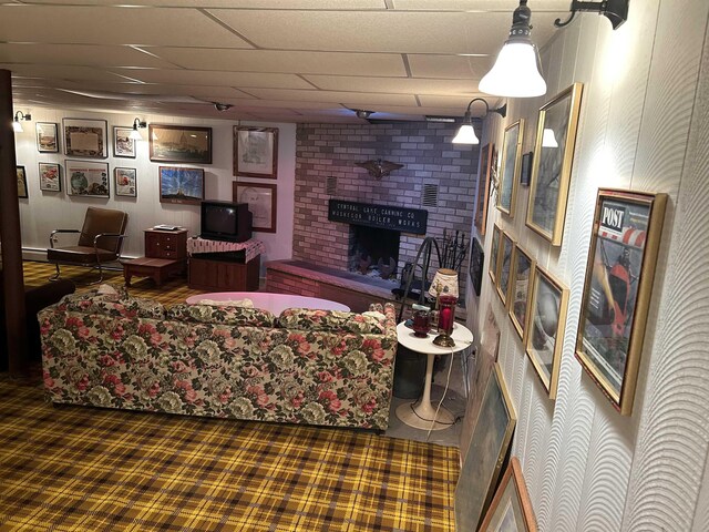 2768 S M-88, Bellaire, MI 49615 - living room featuring a brick fireplace