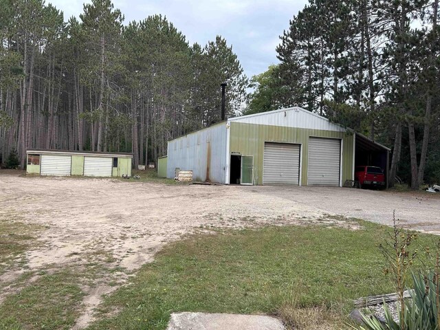 2768 S M-88, Bellaire, MI 49615 - garage with a carport