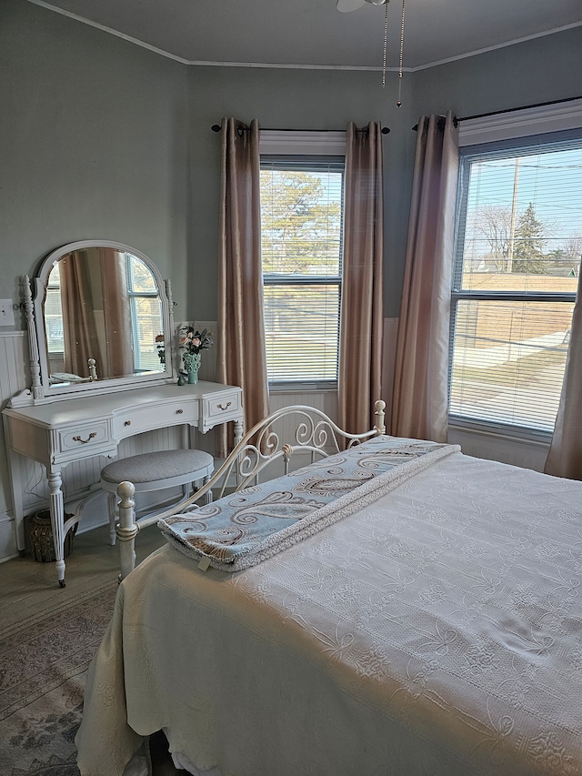 bedroom with multiple windows