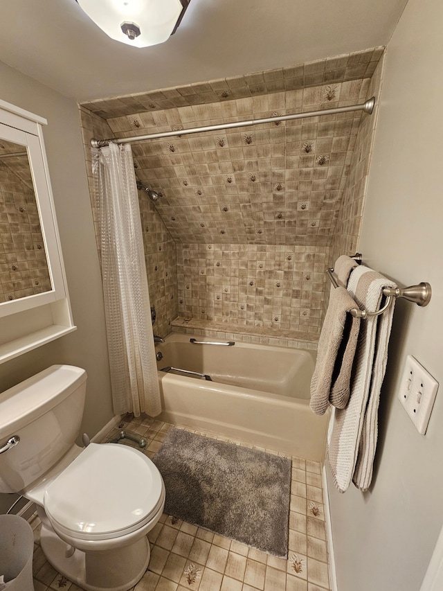 bathroom with tile patterned flooring, toilet, and shower / tub combo with curtain