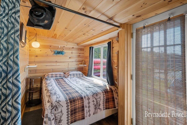 748 Kimberly Dr NE, Sparta, MI 49345 - bedroom with wooden walls, access to outside, and wooden ceiling