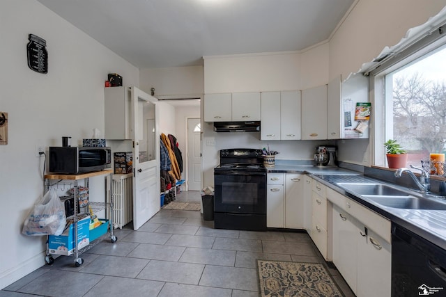 kitchen featuring white cabinetry, sink, tile patterned flooring, crown molding, and black appliances