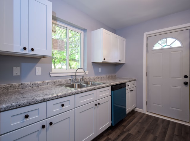 kitchen with white cabinets, dishwasher, sink, and a wealth of natural light