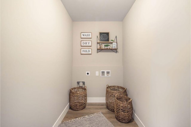 washroom with light wood-type flooring, hookup for a washing machine, and electric dryer hookup