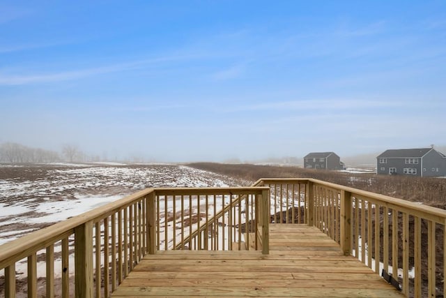 view of snow covered deck