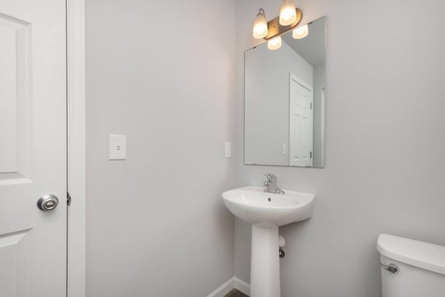 bathroom featuring toilet