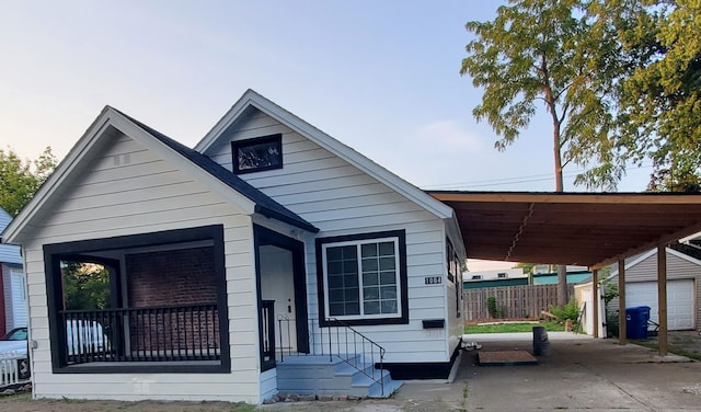 view of front of home with a carport