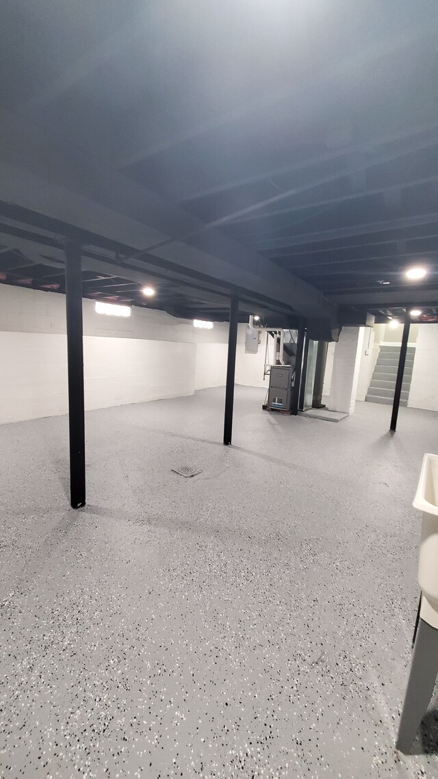 finished below grade area featuring stairs