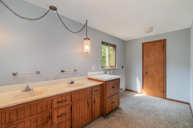 5430 Tittabawassee Rd, Kochville, MI 48604 - bathroom featuring double vanity, carpet, and baseboards