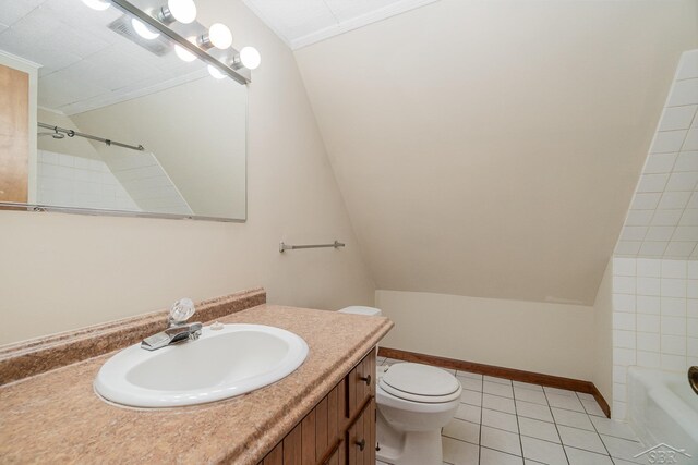 5430 Tittabawassee Rd, Kochville, MI 48604 - bathroom with vanity, toilet, tile patterned floors, shower / bath combination, and lofted ceiling