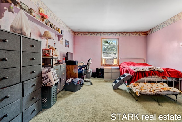 bedroom with carpet flooring and cooling unit