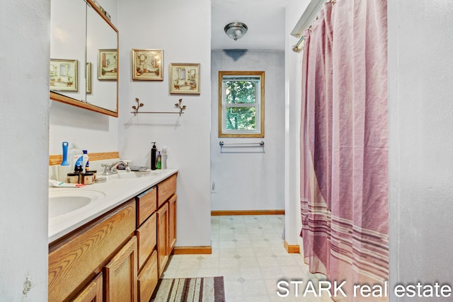 bathroom with vanity and a shower with curtain