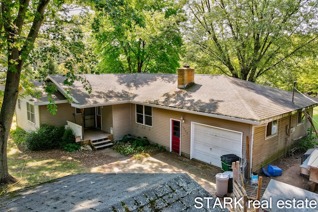 single story home featuring a garage