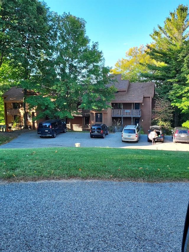 front facade with a front lawn