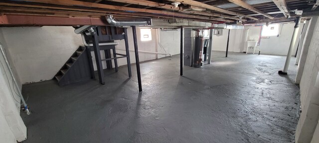 9185 Meyers Rd, Detroit, MI 48228 - below grade area featuring water heater and stairway
