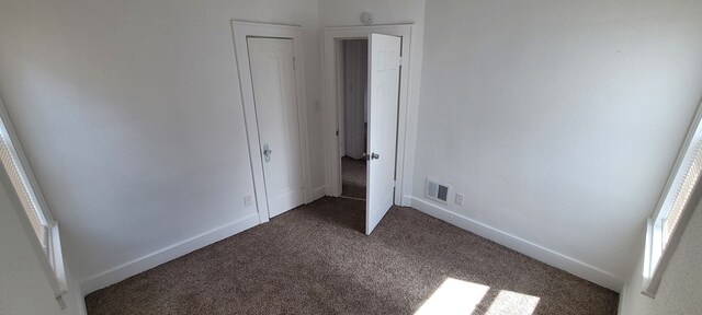 9185 Meyers Rd, Detroit, MI 48228 - unfurnished bedroom with carpet and baseboards