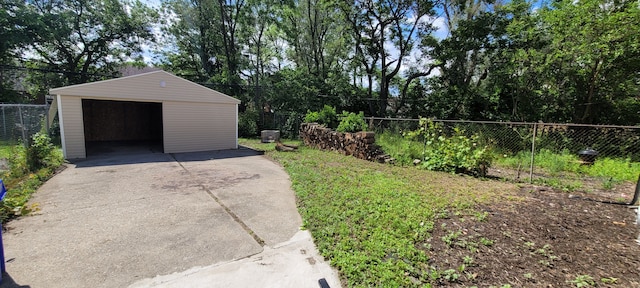 exterior space with an outdoor structure and a garage