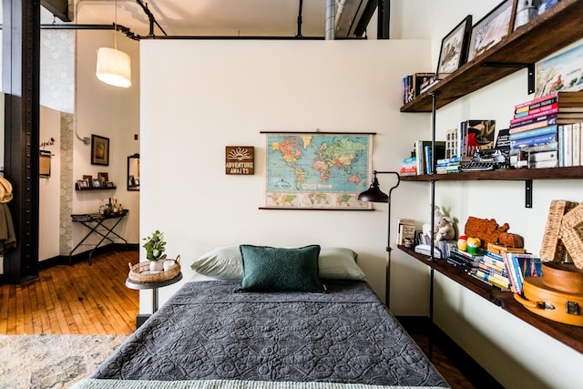 bedroom featuring hardwood / wood-style floors