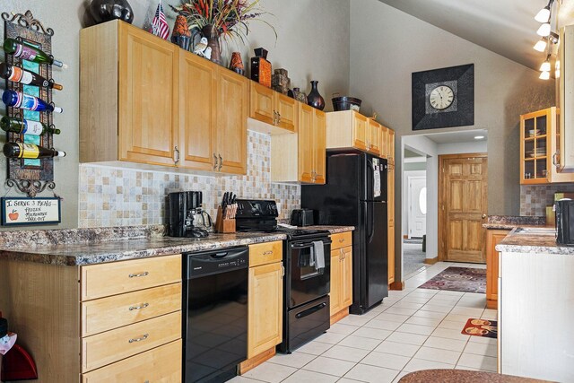 1100 Tisdale Rd, Roscommon, MI 48653 - kitchen with black appliances, decorative backsplash, light tile patterned floors, light brown cabinetry, and high vaulted ceiling