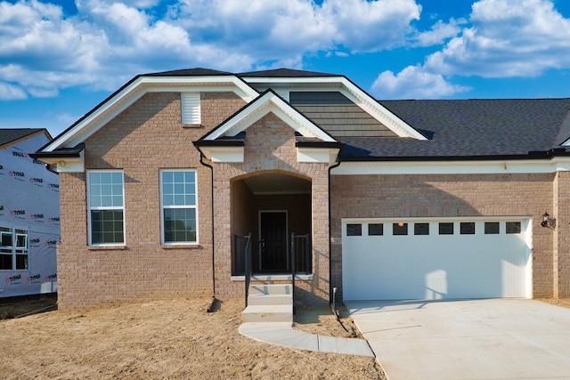 view of front of property featuring a garage