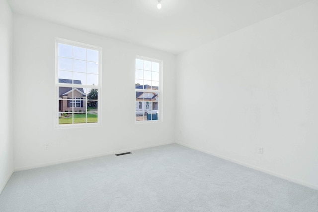 spare room with carpet flooring